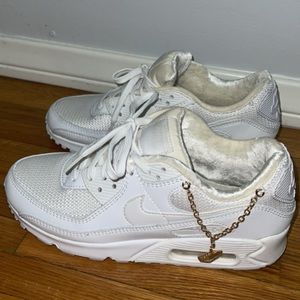 White womans nike with adjustable and removable chain details